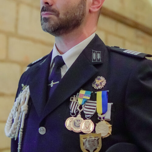 Photo of Mr. Pedro Magrinho Chefe da Polícia de Segurança Pública de Sintra receiving the Martin Luther King Award from Jethro International