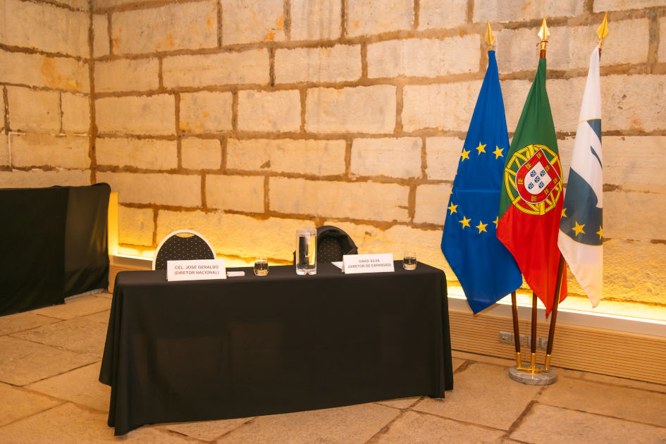 Image of flags european union, portugal, and civil diplomat jethro international flag