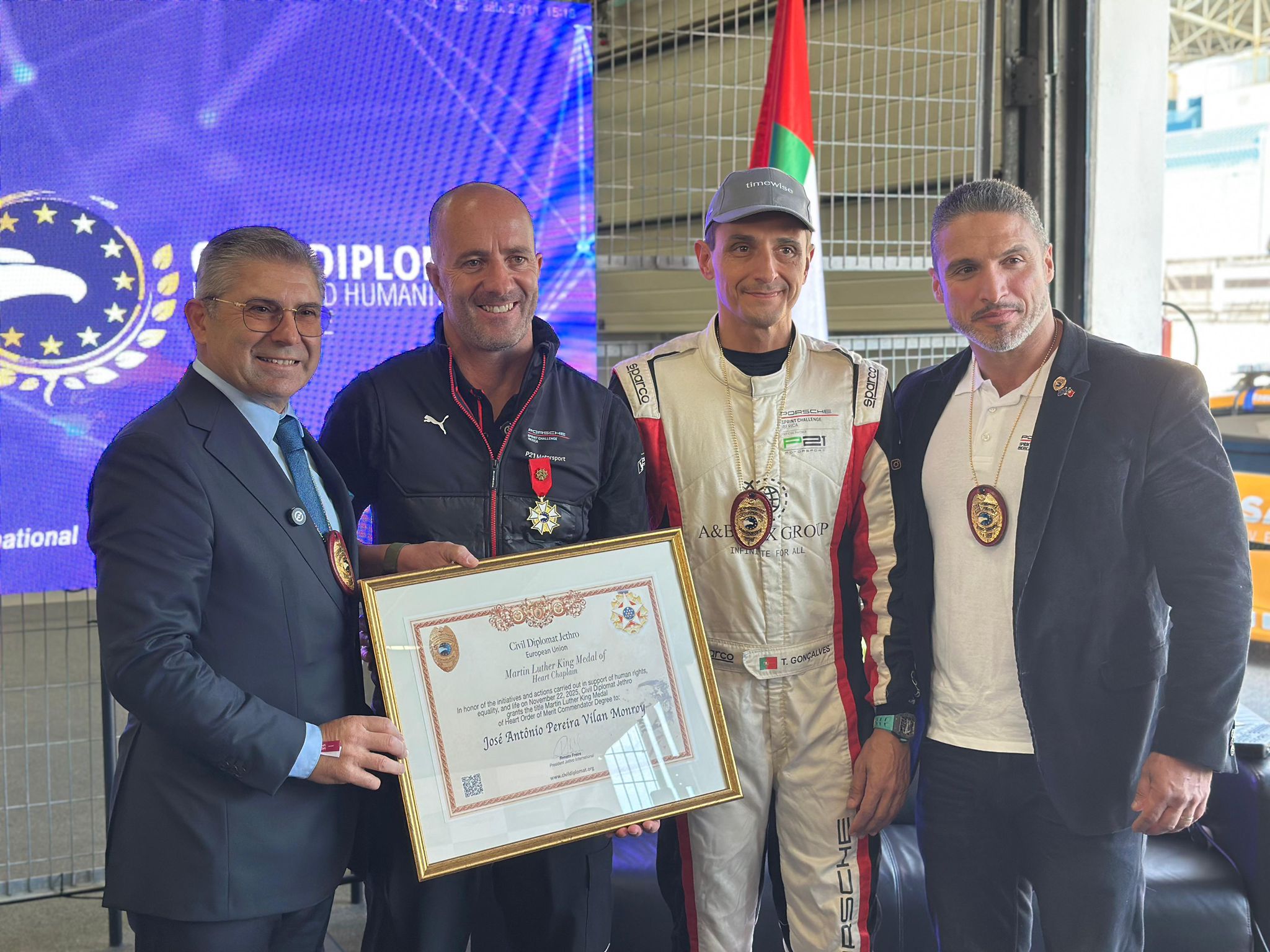 Image of the Civil Diplomat Jethro International at the Prosche Sprint Challenge and the Martin Luther King Award to Jose Monroy racing driver Porsche