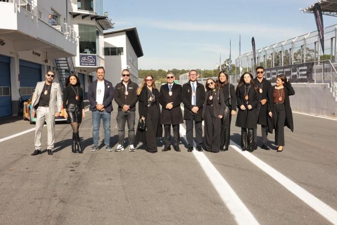 Image of the Civil Diplomat Jethro International at the Prosche Sprint Challenge and the Martin Luther King Award to Jose Monroy racing driver Porsche