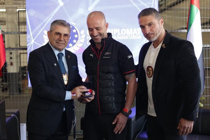 Image of the Civil Diplomat Jethro International at the Prosche Sprint Challenge and the Martin Luther King Award to Jose Monroy racing driver Porsche
