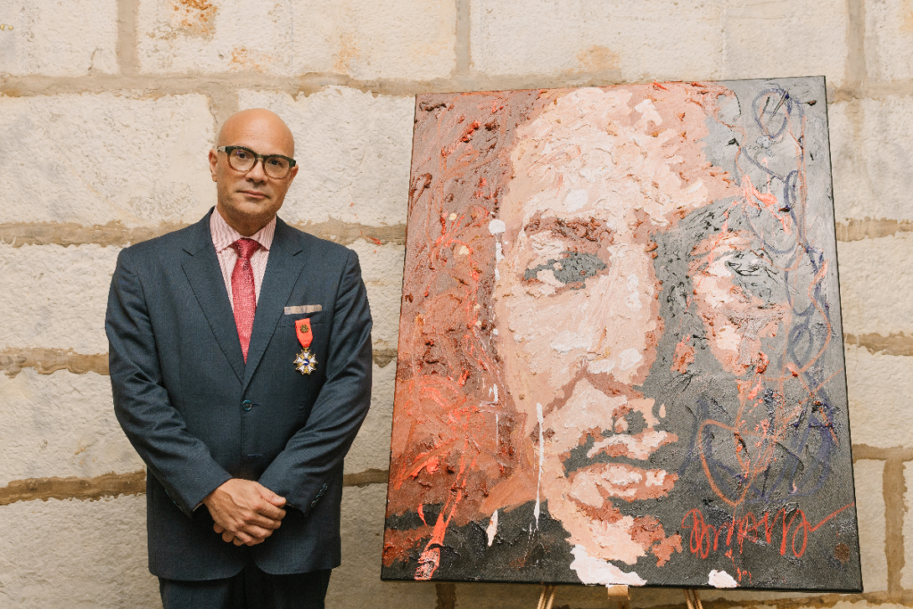 Ramaya Vallias live painting Presença que Ecoa MLK during Jethro International solemn ceremony.